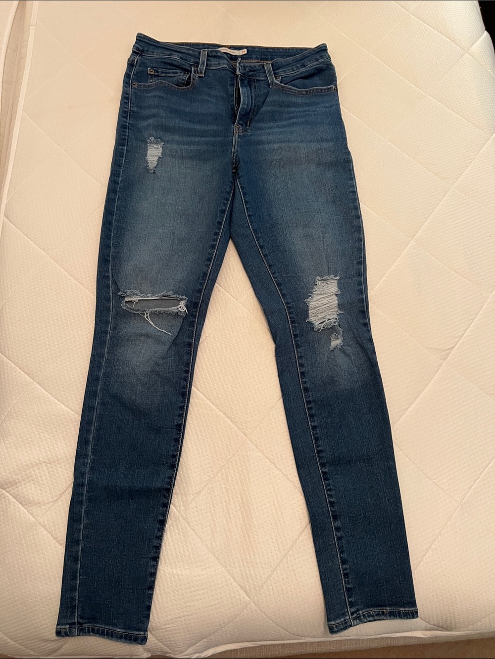 Levi’s Women's Dark Blue Distressed Skinny Jeans